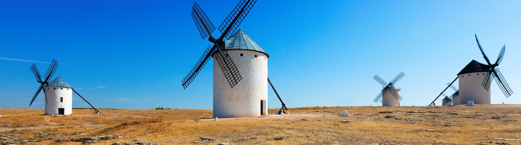 group-windmills (kopie) Group of windmills in Campo de Criptana in summer. La Mancha, Spain